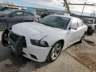 2014 Dodge Charger Police with VIN 2C3CDXAT7EH261944, listed as a Copart auction lot 50071295 with 56,597 mi miles and Salvage Title. Bid and sale history available at carsss.com. Image 1.