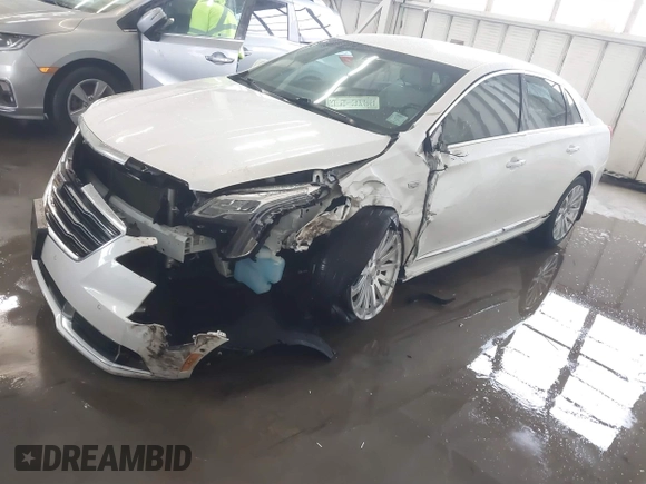 2018 Cadillac XTS Luxury z VIN 2G61M5S38J9156679, wystawiony jako IAAI lot #41574733 z przebiegiem 65 637 mil mil oraz . Historia ofert i sprzedaży dostępna na DreamBid. Obrazek 19.