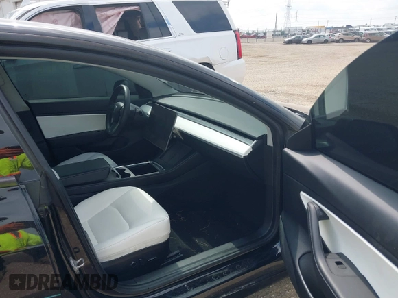 2021 Tesla Model 3 Performance with VIN 5YJ3E1EC5MF919278, listed as a IAAI auction lot 40194677 with 50,484 mi miles and . Bid and sale history available at carsss.com. Image 5.