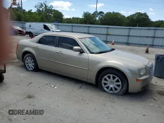 2009 Chrysler 300 Touring with VIN 2C3KA53V69H592639, listed as a Copart auction lot 55209775 with 107,751 mi miles and Salvage Title. Bid and sale history available at DreamBid. Image 4.