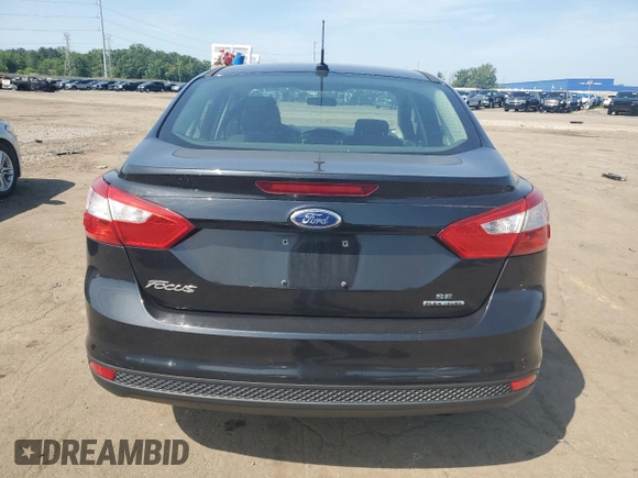 2013 Ford Focus SE with VIN 1FADP3F20DL242367, listed as a Copart auction lot 61382545 with 67,720 mi miles and Clean title. Bid and sale history available at DreamBid. Image 6.