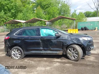 2022 Ford Edge Titanium with VIN 2FMPK4K95NBA45450, listed as a IAAI auction lot 42149752 with Not provided miles and . Bid and sale history available at DreamBid. Image 12.