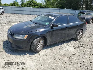 2013 Volkswagen Jetta SE with VIN 3VWDP7AJ3DM355421, listed as a Copart auction lot 63753015 with 203,322 mi miles and Salvage title. Bid and sale history available at DreamBid. Image 1.