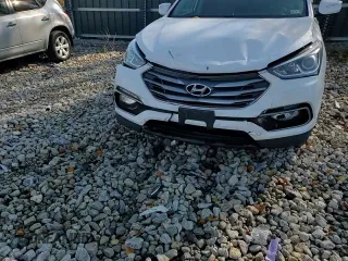 2017 Hyundai Santa Fe 2.0T z VIN 5XYZUDLA3HG397569, wystawiony jako Copart lot #77360944 z przebiegiem 145 512 mil mil oraz Szkoda całkowita • Salvage title. Historia ofert i sprzedaży dostępna na DreamBid. Obrazek 12.