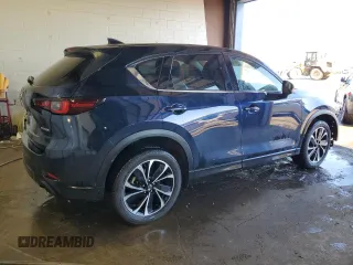 2023 Mazda CX-5 2.5 S Premium Package with VIN JM3KFBDM3P0135040, listed as a Copart auction lot 44315985 with 21,127 mi miles and Salvage Title. Bid and sale history available at carsss.com. Image 3.
