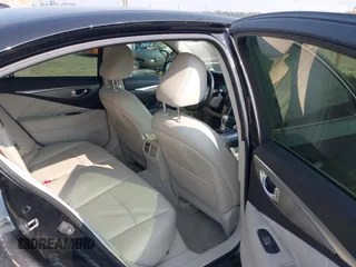 2015 Infiniti Q50 Premium with VIN JN1BV7AP5FM334429, listed as a IAAI auction lot 42389298 with 146,126 mi miles and . Bid and sale history available at DreamBid. Image 8.