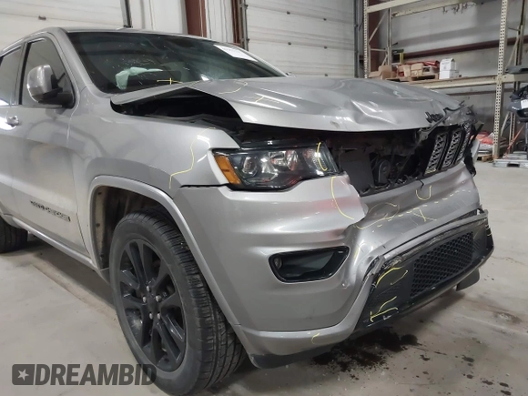 2018 Jeep Grand Cherokee Laredo E with VIN 1C4RJFAG6JC102969, listed as a IAAI auction lot 41963137 with 112,361 mi miles and . Bid and sale history available at DreamBid. Image 17.