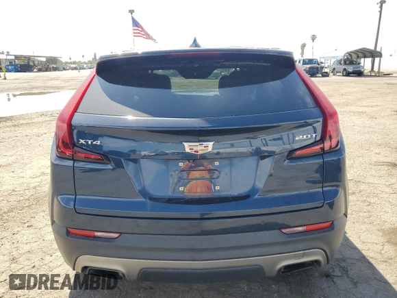 2019 Cadillac XT4 FWD Premium Luxury with VIN 1GYFZCR42KF104457, listed as a Copart auction lot 52783485 with 57,572 mi miles and Salvage title. Bid and sale history available at DreamBid. Image 6.