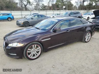 2013 Jaguar XJ with VIN SAJWA2G12DLV57581, listed as a Copart auction lot 84736054 with 91,779 mi miles and Salvage Title. Bid and sale history available at carsss.com. Image 1.