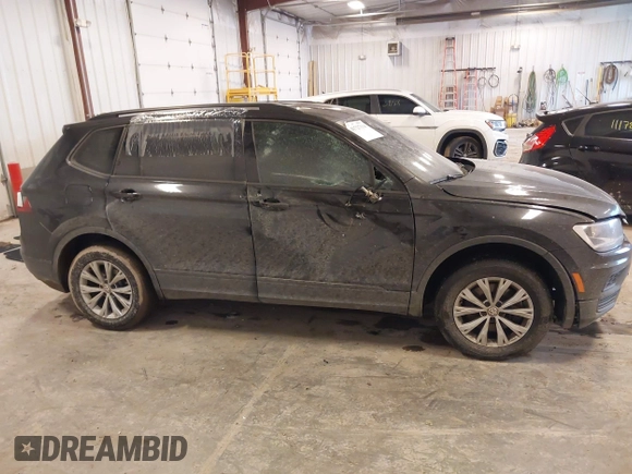 2019 Volkswagen Tiguan S with VIN 3VV0B7AX3KM182311, listed as a IAAI auction lot 41727114 with 98,035 mi miles and . Bid and sale history available at DreamBid. Image 13.