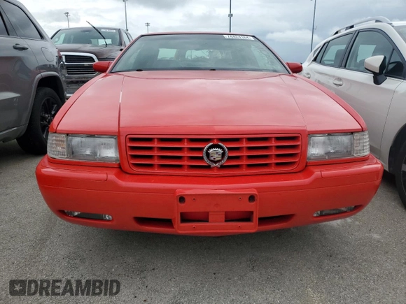2002 Cadillac Eldorado z VIN 1G6EC129X2B106142, wystawiony jako Copart lot #74424164 z przebiegiem Nie podano mil oraz Szkoda całkowita • Salvage title. Historia ofert i sprzedaży dostępna na DreamBid. Obrazek 5.
