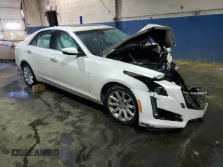 2014 Cadillac CTS Luxury AWD with VIN 1G6AX5S3XE0140684, listed as a Copart auction lot 87905125 with 140,561 mi miles and Clean Title. Bid and sale history available at DreamBid. Image 4.