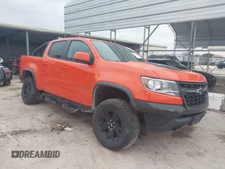 2019 Chevrolet Colorado 4WD ZR2 z VIN 1GCGTEEN9K1333740, wystawiony jako IAAI lot #41565621 z przebiegiem 71 484 mil mil oraz . Historia ofert i sprzedaży dostępna na DreamBid. Obrazek 1.