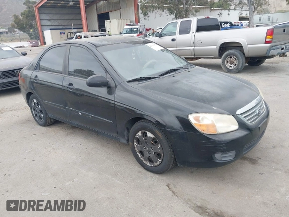 2008 Kia Spectra EX with VIN KNAFE122985511931, listed as a IAAI auction lot 42111053 with 251,276 mi miles. Bid and sale history available at carsss.com. Image 1.