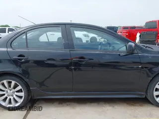 2009 Mitsubishi Lancer with VIN JA3AU86W29U039924, listed as a IAAI auction lot 41923692 with 183,591 mi miles and . Bid and sale history available at DreamBid. Image 14.