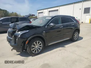 2021 Cadillac XT4 FWD Premium Luxury z VIN 1GYFZCR48MF002468, wystawiony jako Copart lot #50878955 z przebiegiem 76 034 mil mil oraz Szkoda całkowita • Salvage title. Historia ofert i sprzedaży dostępna na DreamBid. Obrazek 1.