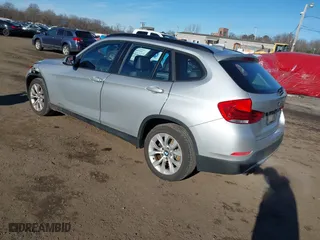 2013 BMW X1 xDrive28i with VIN WBAVL1C57DVR84747, listed as a IAAI auction lot 41273794 with 93,738 mi miles. Bid and sale history available at carsss.com. Image 3.
