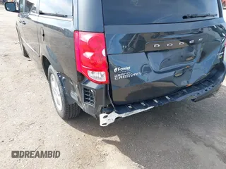 2011 Dodge Grand Caravan Crew with VIN 2D4RN5DG3BR660235, listed as a IAAI auction lot 41945522 with 148,924 mi miles and . Bid and sale history available at DreamBid. Image 6.