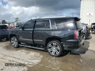 2017 GMC Yukon Denali with VIN 1GKS1CKJ7HR261831, listed as a Copart auction lot 79091724 with 156,082 mi miles and Salvage Title. Bid and sale history available at carsss.com. Image 2.