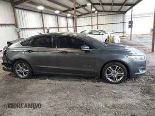 2015 Ford Fusion SE Hybrid with VIN 3FA6P0LU6FR248904, listed as a IAAI auction lot 41556607 with 224,799 mi miles. Bid and sale history available at carsss.com. Image 13.