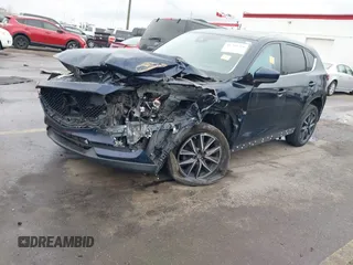 2018 Mazda CX-5 Grand Touring with VIN JM3KFBDM8J0345821, listed as a IAAI auction lot 41789284 with 1 mi miles. Bid and sale history available at carsss.com. Image 2.