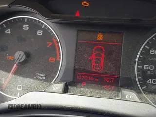 2011 Audi A4 Premium z VIN WAUAFAFL0BN040110, wystawiony jako IAAI lot #41990720 z przebiegiem 107 016 mil mil oraz . Historia ofert i sprzedaży dostępna na DreamBid. Obrazek 7.