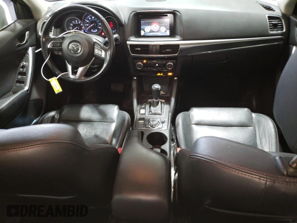 2016 Mazda CX-5 Grand Touring with VIN JM3KE4DY1G0714674, listed as a Copart auction lot 75516524 with 115,766 mi miles and Salvage Title. Bid and sale history available at carsss.com. Image 8.