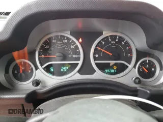2010 Jeep Wrangler Unlimited Rubicon with VIN 1J4BA6H17AL109880, listed as a Copart auction lot 44205455 with 95,781 mi miles and Salvage title. Bid and sale history available at DreamBid. Image 9.