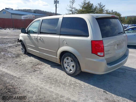 2012 Dodge Grand Caravan SE with VIN 2C4RDGBG3CR385529, listed as a IAAI auction lot 41506810 with 153,300 mi miles. Bid and sale history available at carsss.com. Image 3.