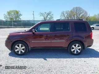 2012 Honda Pilot Touring with VIN 5FNYF4H90CB020623, listed as a IAAI auction lot 42048740 with 162,504 mi miles. Bid and sale history available at carsss.com. Image 14.