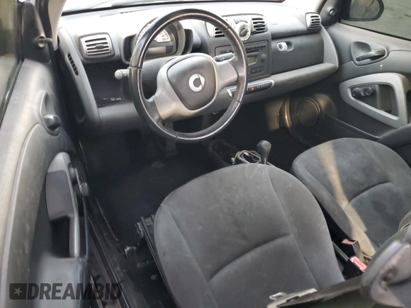 2008 Smart fortwo Pure z VIN WMEEJ31X48K150064, wystawiony jako Copart lot #42133475 z przebiegiem 103 280 mil mil oraz Szkody całkowita. Historia ofert i sprzedaży dostępna na DreamBid. Obrazek 8.