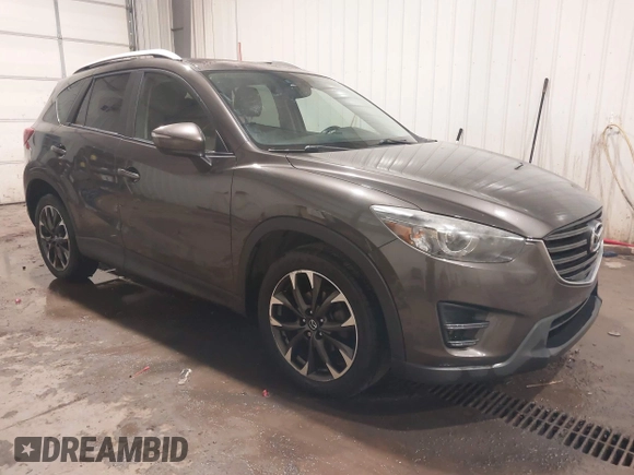 2016 Mazda CX-5 Grand Touring with VIN JM3KE4DY0G0732843, listed as a IAAI auction lot 41520889 with 149,798 mi miles. Bid and sale history available at carsss.com. Image 1.