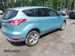 2013 Ford Escape SE z VIN 1FMCU0GX1DUD22225, wystawiony jako IAAI lot #42755402 z przebiegiem 180 784 mil mil oraz . Historia ofert i sprzedaży dostępna na DreamBid. Obrazek 4.