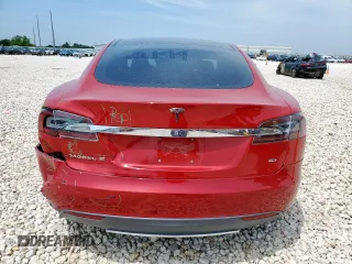 2014 Tesla Model S 60 with VIN 5YJSA1H18EFP38582, listed as a Copart auction lot 56581735 with 69,106 mi miles and Salvage title. Bid and sale history available at DreamBid. Image 6.