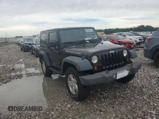 2010 Jeep Wrangler Rubicon with VIN 1J4BA6D14AL198524, listed as a Copart auction lot 65260235 with Not provided miles and Clean title. Bid and sale history available at DreamBid. Image 5.