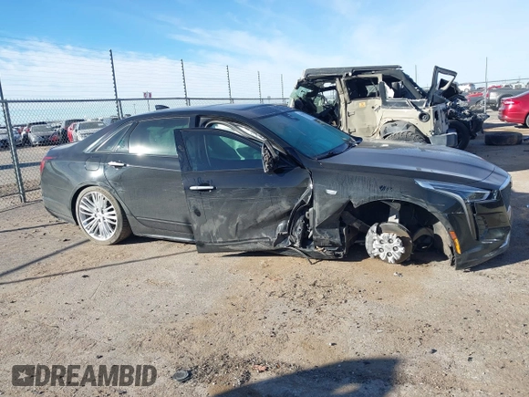 2019 Cadillac CT6 Sport AWD with VIN 1G6KP5R63KU142155, listed as a IAAI auction lot 41233947 with 72,501 mi miles and . Bid and sale history available at DreamBid. Image 14.