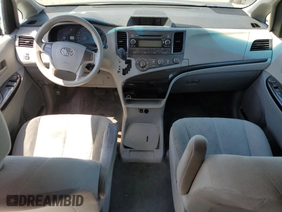 2012 Toyota Sienna с VIN 5TDZK3DC0CS190388, выставлен на аукционе Copart как лот 58564315 с пробегом 256 936 миль миль и Списание • Salvage title. История ставок и продаж доступна на DreamBid. Изображение 8.