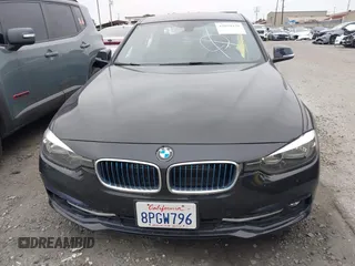 2017 BMW 3 Series 330e iPerformance with VIN WBA8E1C58HK480271, listed as a IAAI auction lot 42039429 with 93,242 mi miles. Bid and sale history available at carsss.com. Image 13.