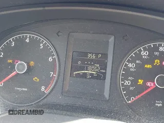 2014 Volkswagen Jetta S z VIN 3VW2K7AJ3EM221290, wystawiony jako IAAI lot #42310867 z przebiegiem 118 062 mil mil oraz . Historia ofert i sprzedaży dostępna na DreamBid. Obrazek 16.