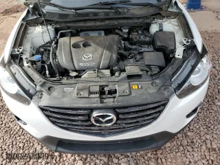 2016 Mazda CX-5 Grand Touring with VIN JM3KE2DY7G0673794, listed as a Copart auction lot 51016755 with 75,691 mi miles and Salvage Title. Bid and sale history available at carsss.com. Image 12.