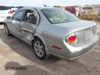 2002 Nissan Maxima GLE z VIN JN1DA31A22T302286, wystawiony jako IAAI lot #41929154 z przebiegiem 249 531 mil mil oraz . Historia ofert i sprzedaży dostępna na DreamBid. Obrazek 3.