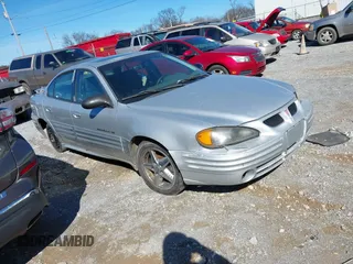 2002 Pontiac Grand Am SE1 with VIN 1G2NF52F12C123508, listed as a IAAI auction lot 41576765 with 161,853 mi miles. Bid and sale history available at carsss.com. Image 1.