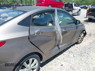 2014 Hyundai Accent GLS with VIN KMHCU4AE7EU736691, listed as a IAAI auction lot 42054514 with 80,715 mi miles and . Bid and sale history available at carsss.com. Image 12.