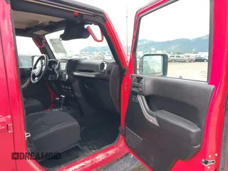 2018 Jeep Wrangler JK Unlimited Sahara with VIN 1C4HJWEG3JL893970, listed as a IAAI auction lot 39530074 with 72,079 mi miles. Bid and sale history available at carsss.com. Image 5.