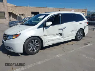 2015 Honda Odyssey Touring Elite with VIN 5FNRL5H91FB038099, listed as a IAAI auction lot 41829649 with 167,017 mi miles and . Bid and sale history available at DreamBid. Image 19.
