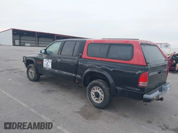 2001 Dodge Dakota Sport with VIN 1B7HG2AN31S225393, listed as a IAAI auction lot 42183298 with 244,961 mi miles and . Bid and sale history available at carsss.com. Image 3.
