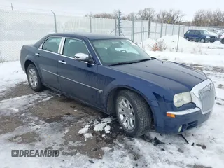2006 Chrysler 300 C with VIN 2C3LA63H96H289693, listed as a IAAI auction lot 41308366 with 128,814 mi miles. Bid and sale history available at carsss.com. Image 1.