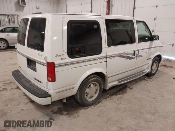 1998 Chevrolet Astro Cargo Van YF7 Upfitter with VIN 1GBDM19W1WB121821, listed as a IAAI auction lot 41463704 with 141,724 mi miles. Bid and sale history available at carsss.com. Image 4.
