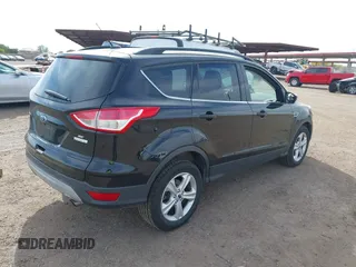 2016 Ford Escape SE with VIN 1FMCU0GX4GUC56208, listed as a IAAI auction lot 42173482 with 124,325 mi miles and . Bid and sale history available at carsss.com. Image 4.