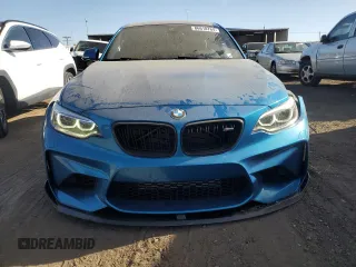 2016 BMW M2 with VIN WBS1H9C52GV351930, listed as a Copart auction lot 86610764 with 55,473 mi miles and Salvage Title. Bid and sale history available at carsss.com. Image 5.